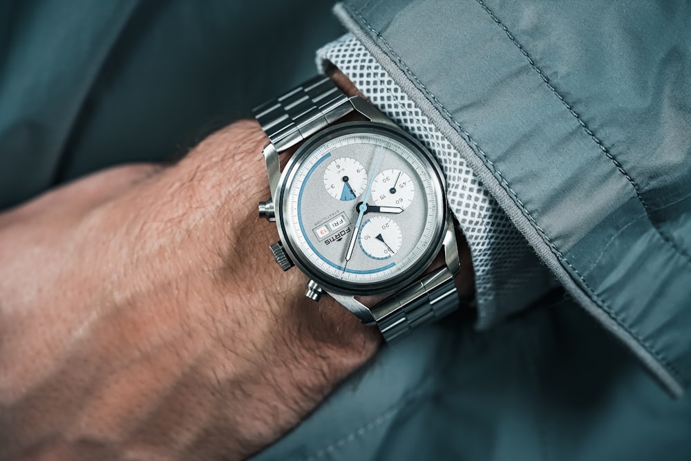 a close up of a person wearing a watch