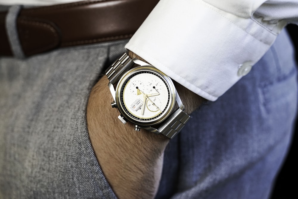 a close up of a person wearing a watch