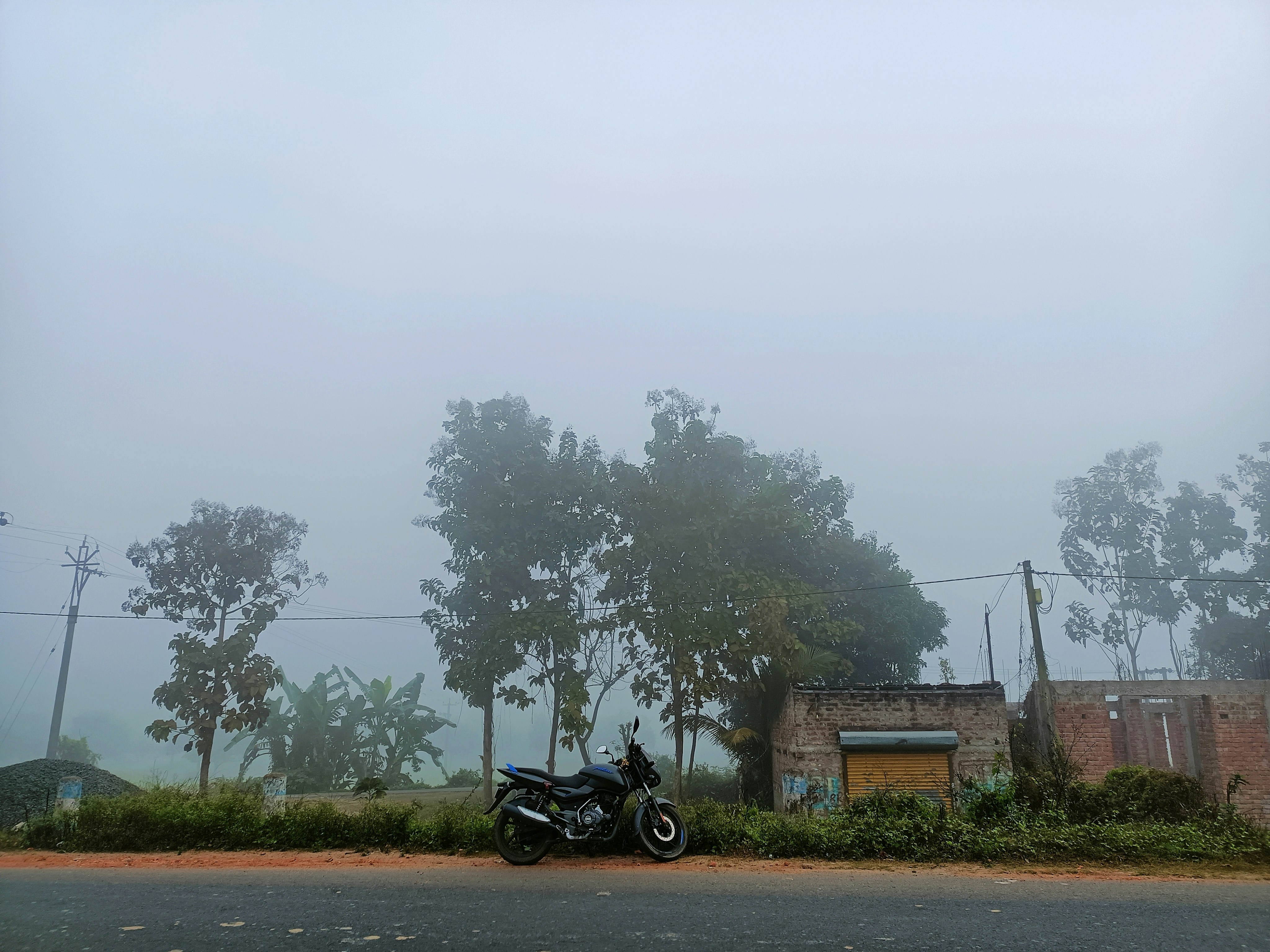 a motorcycle parked on the side of a road