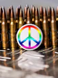 a peace sign on top of a bunch of bullet shells