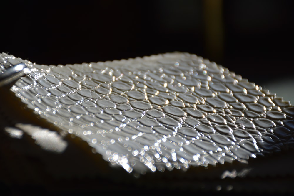a close up of a piece of silver foil