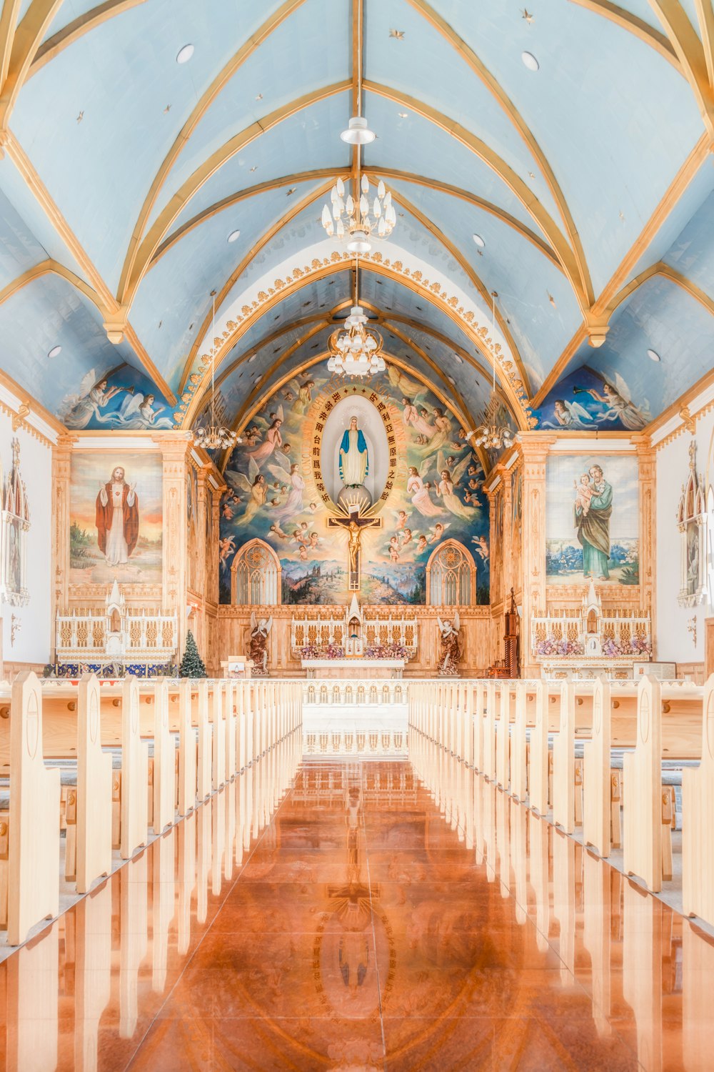 the inside of a church with stained glass windows