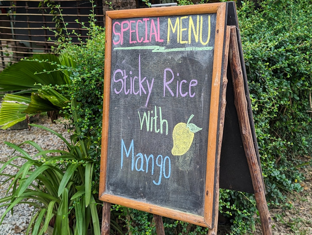 a chalkboard sign with a menu written on it