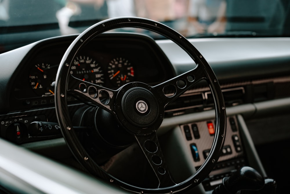 a steering wheel and dashboard of a car