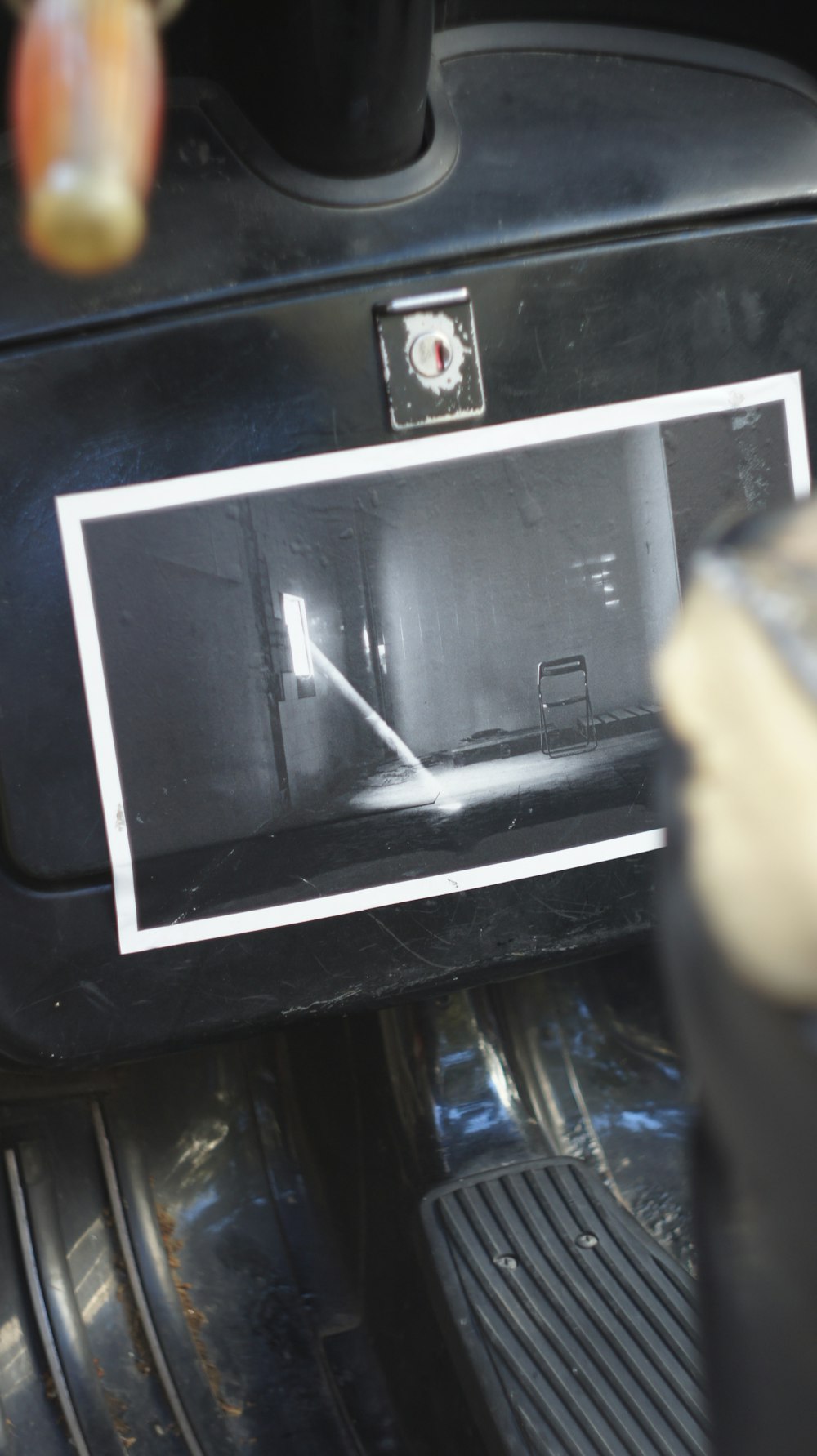 a close up of a microwave oven in a car