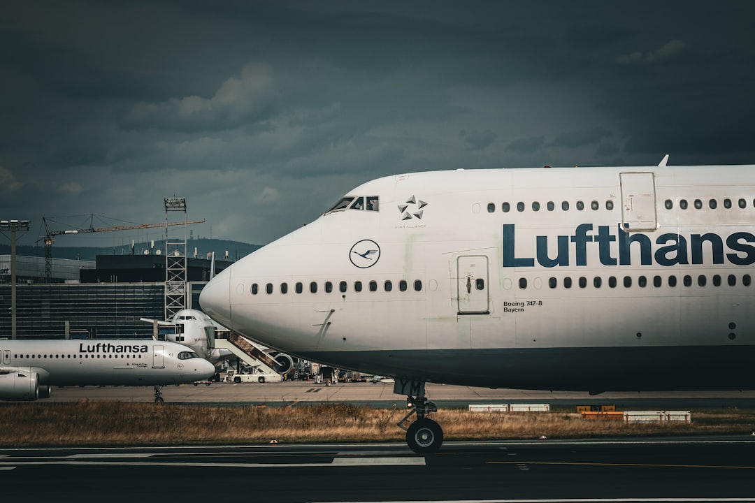 a large jetliner sitting on top of an airport tarmac,