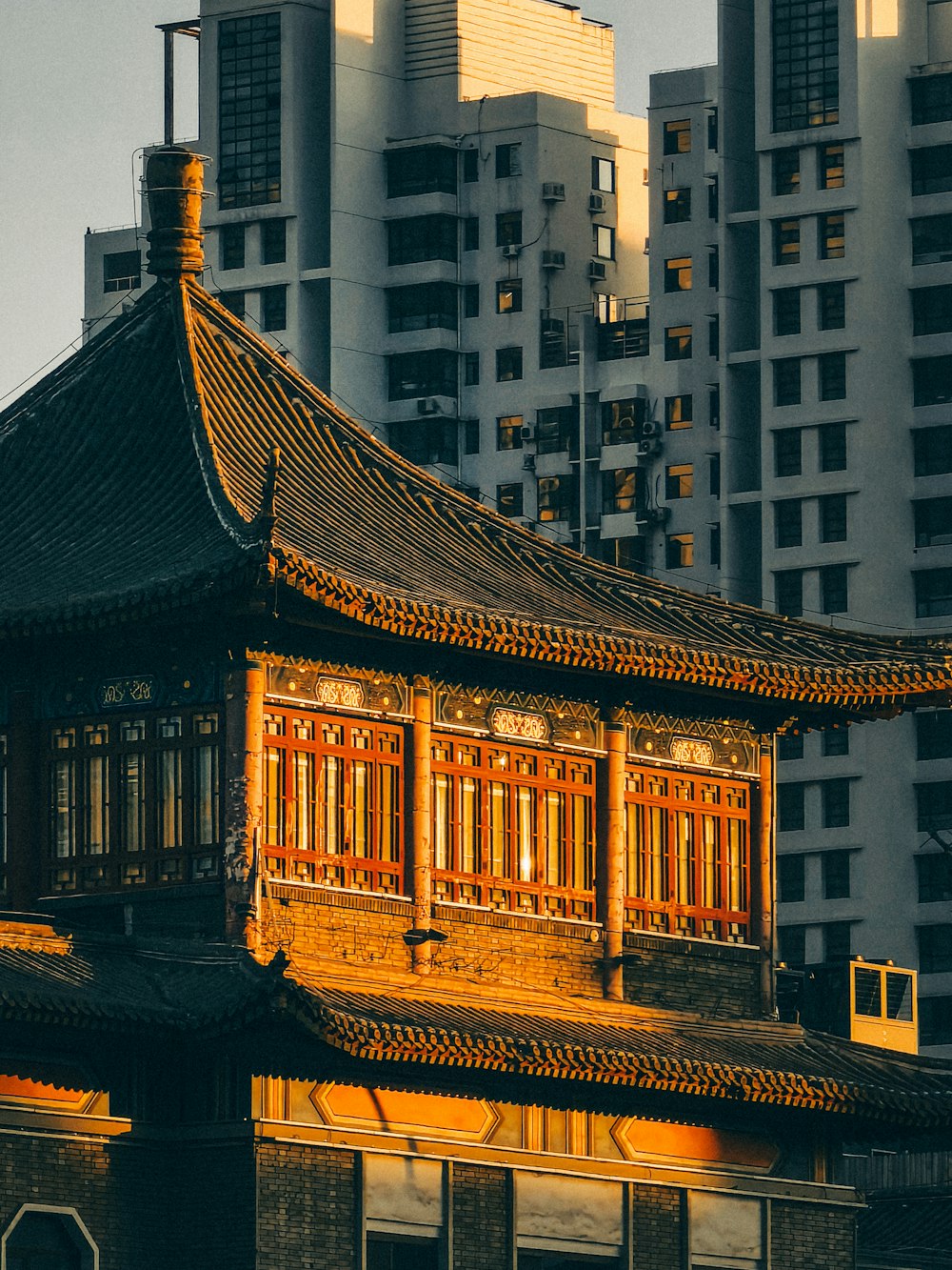 a tall building with a clock on the top of it