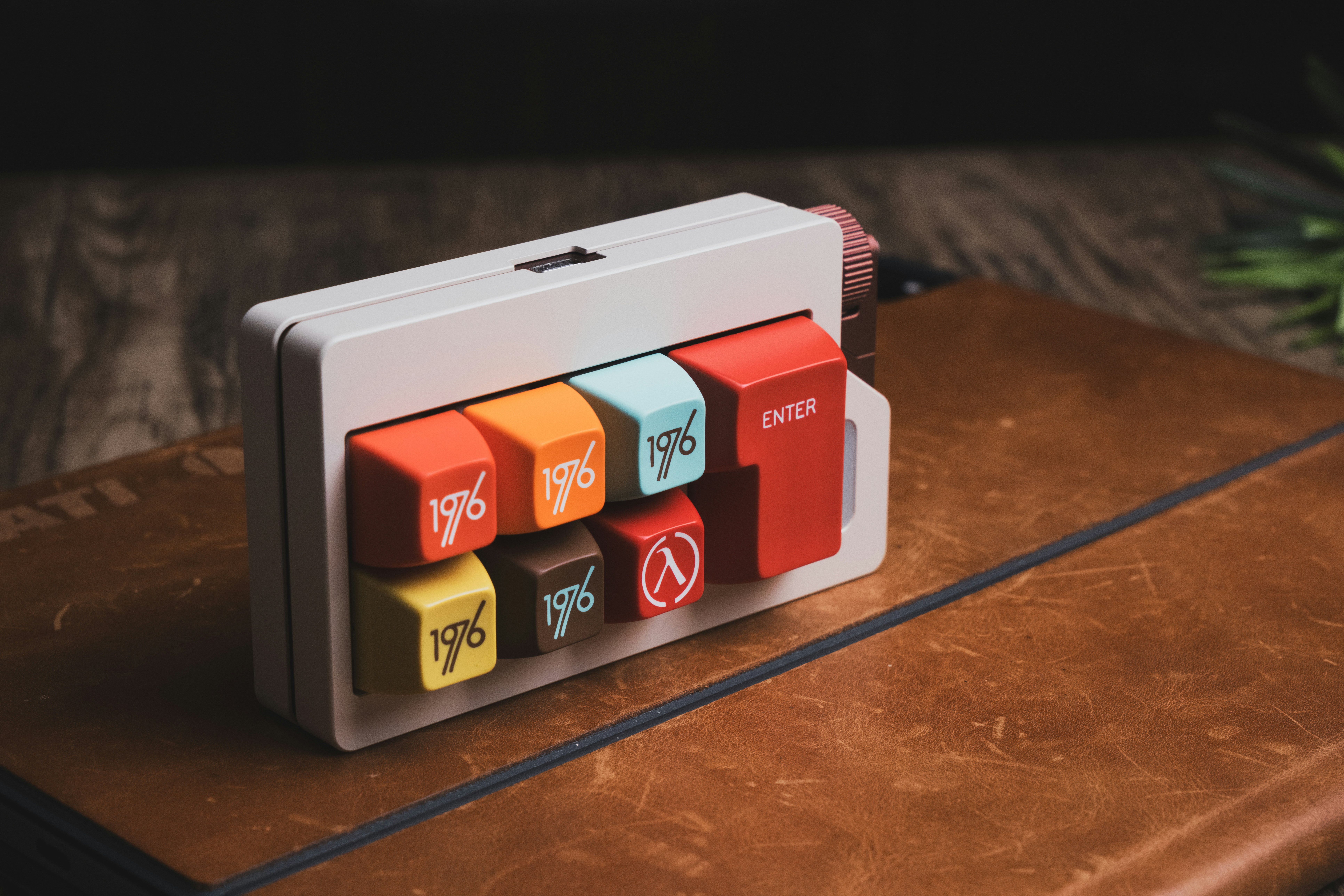 a close up of a wooden box with magnets on it