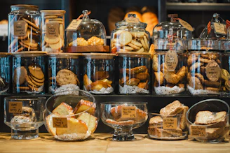 a display case filled with lots of different types of bread