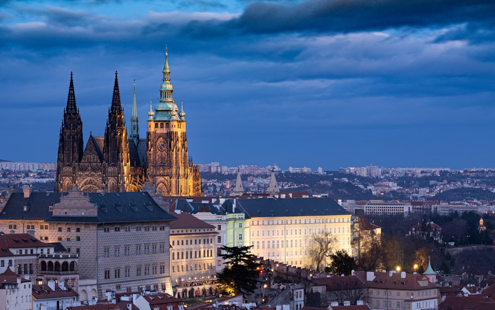 a view of a city with a cathedral in the background