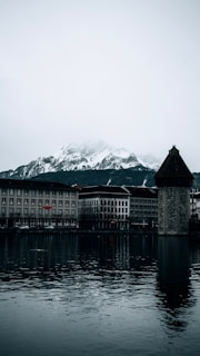 a large building sitting on top of a body of water