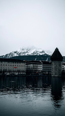 a large building sitting on top of a body of water