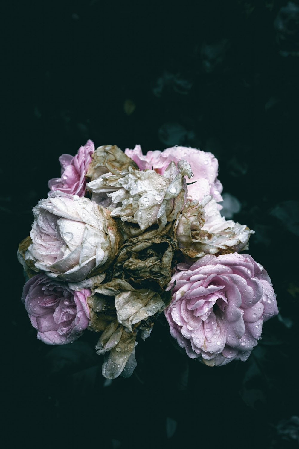 a bunch of flowers that are sitting on a table