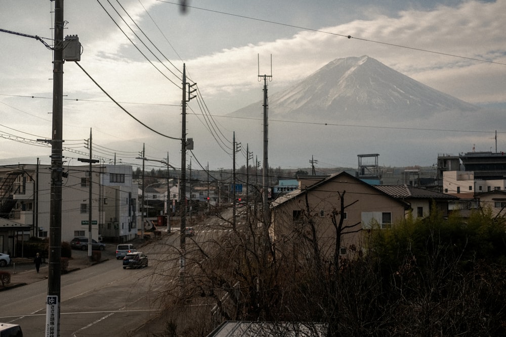 a view of a city with a mountain in the background