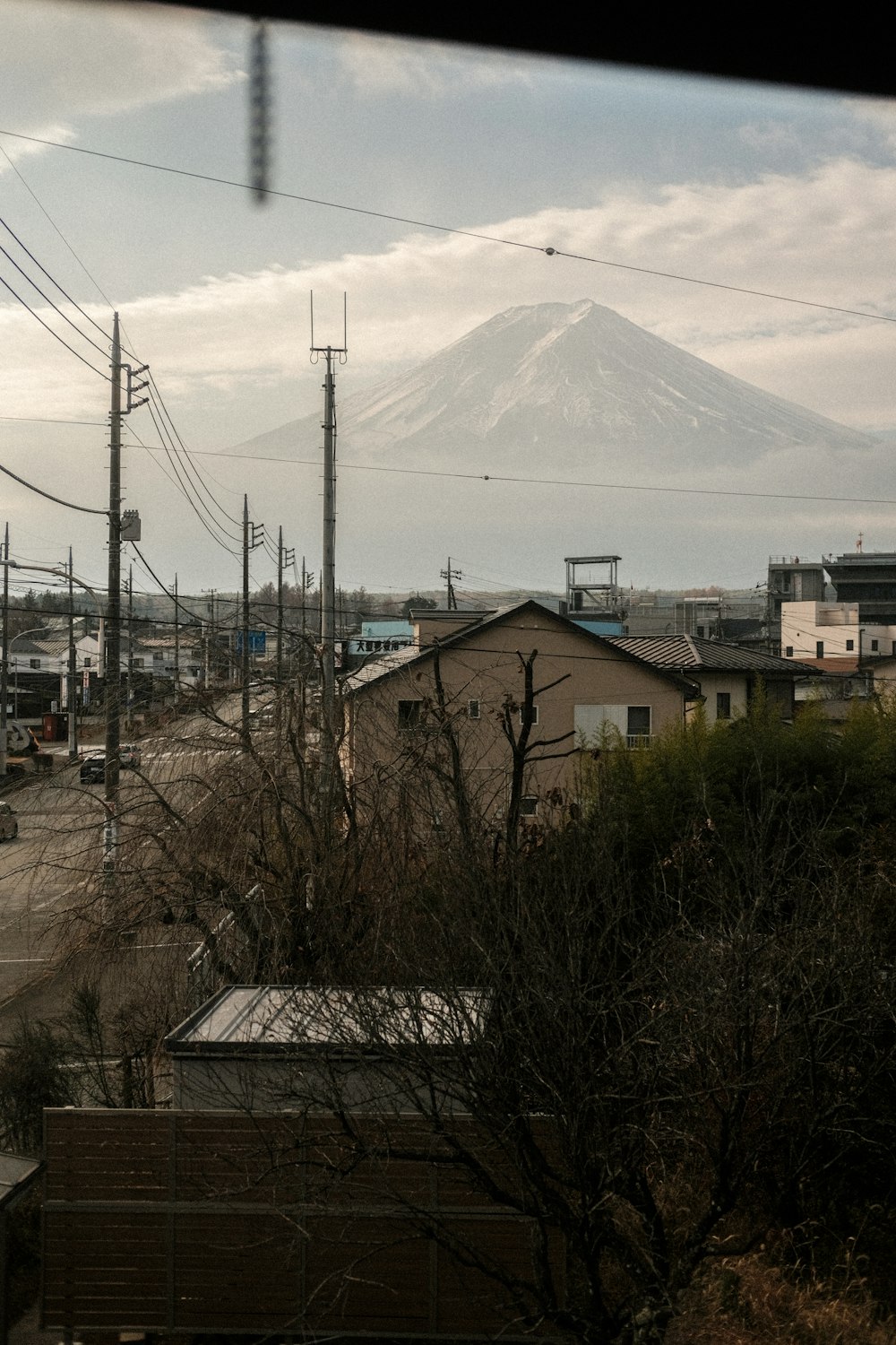 a view of a mountain from a train window