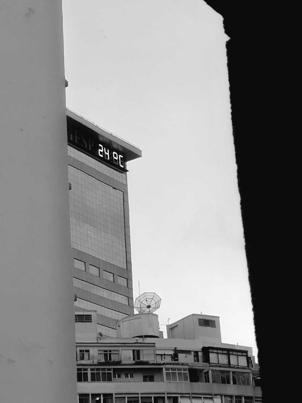 a black and white photo of a tall building