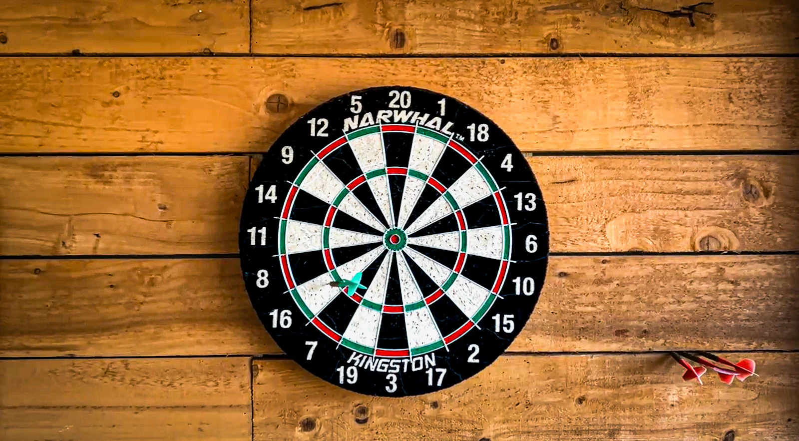 Dartboard on a wood wall