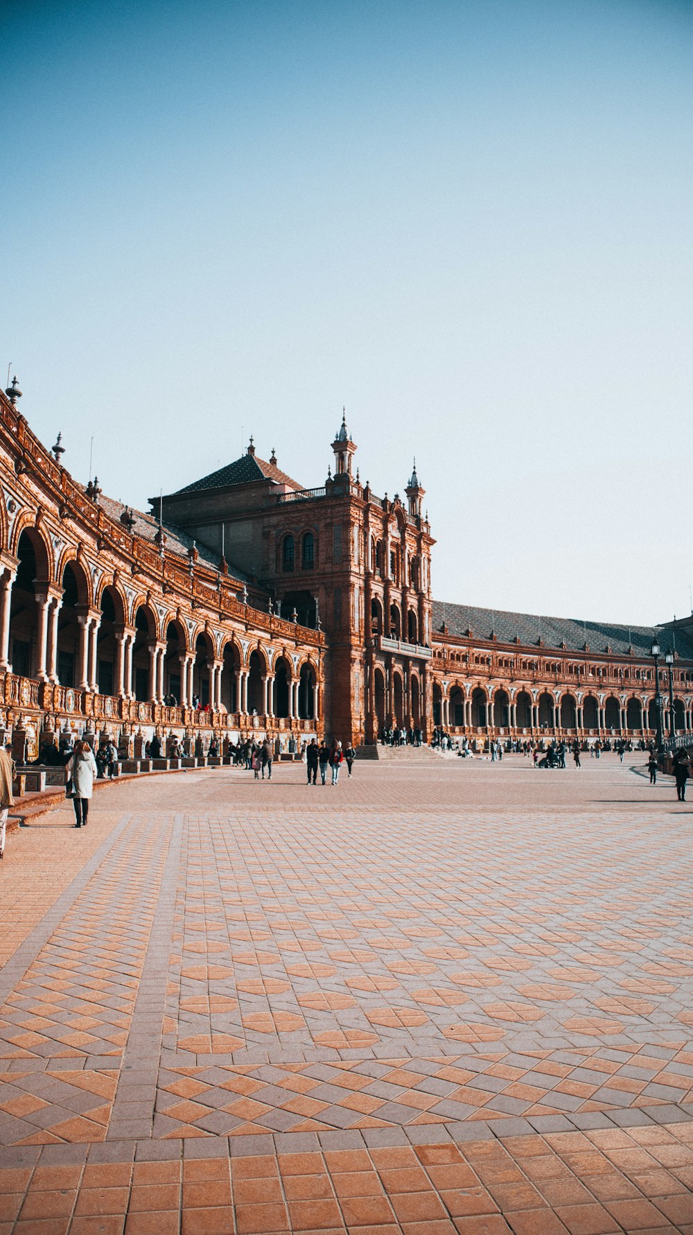 a large building with a clock tower in the middle of it