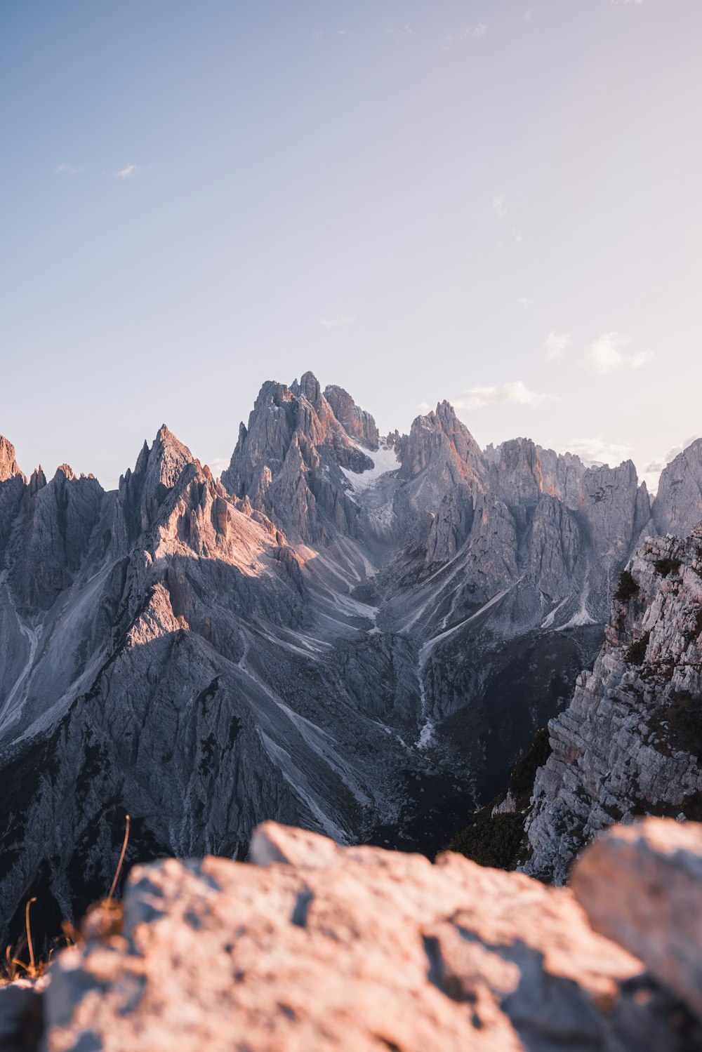 a view of a mountain range from the top of a mountain