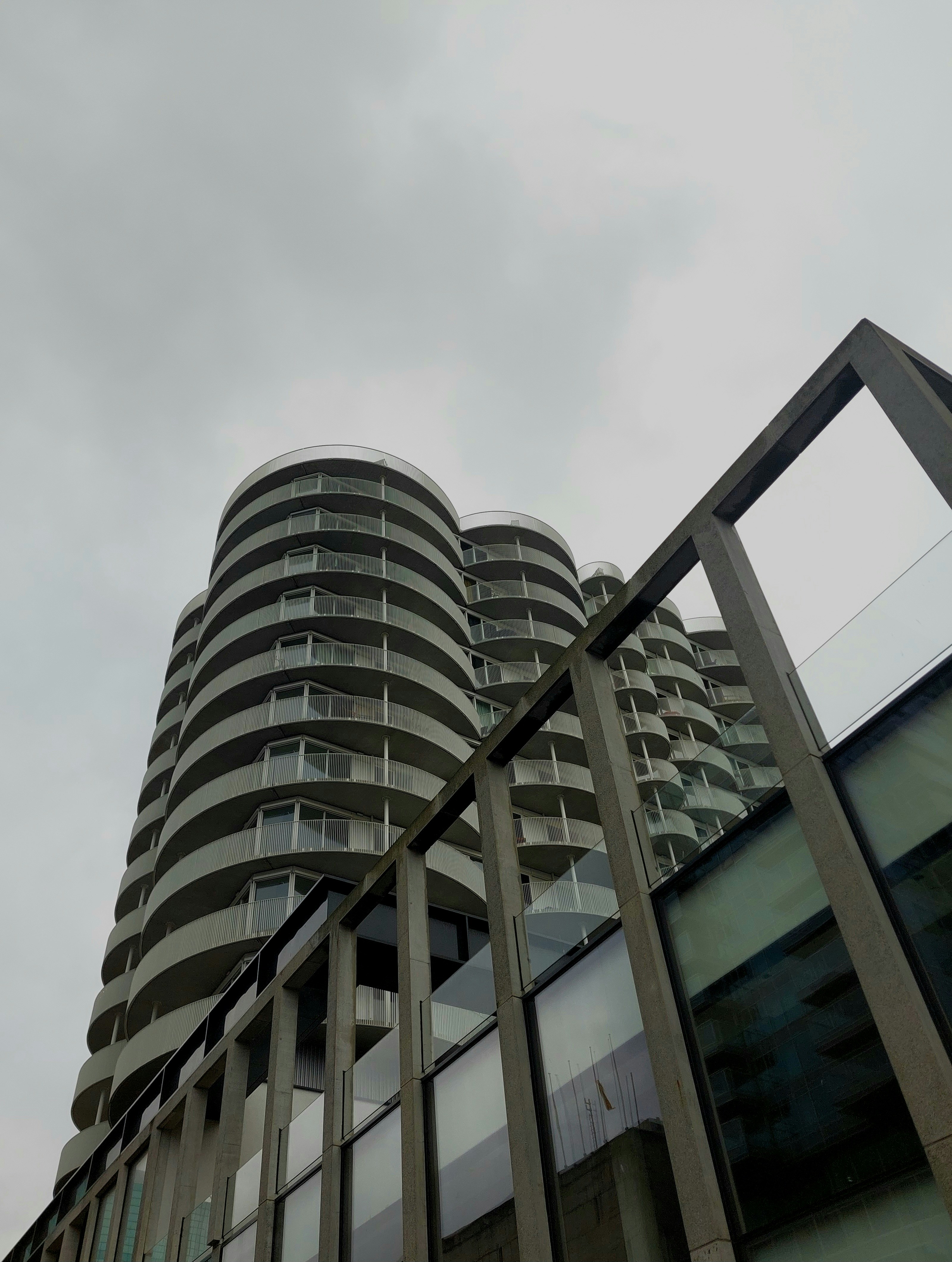 a tall building sitting next to a tall building