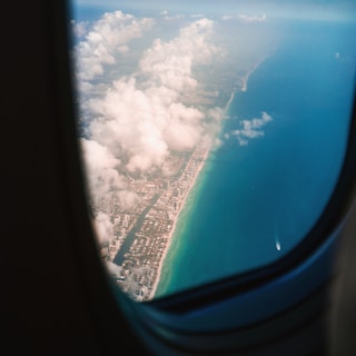 a view of the ocean from an airplane window