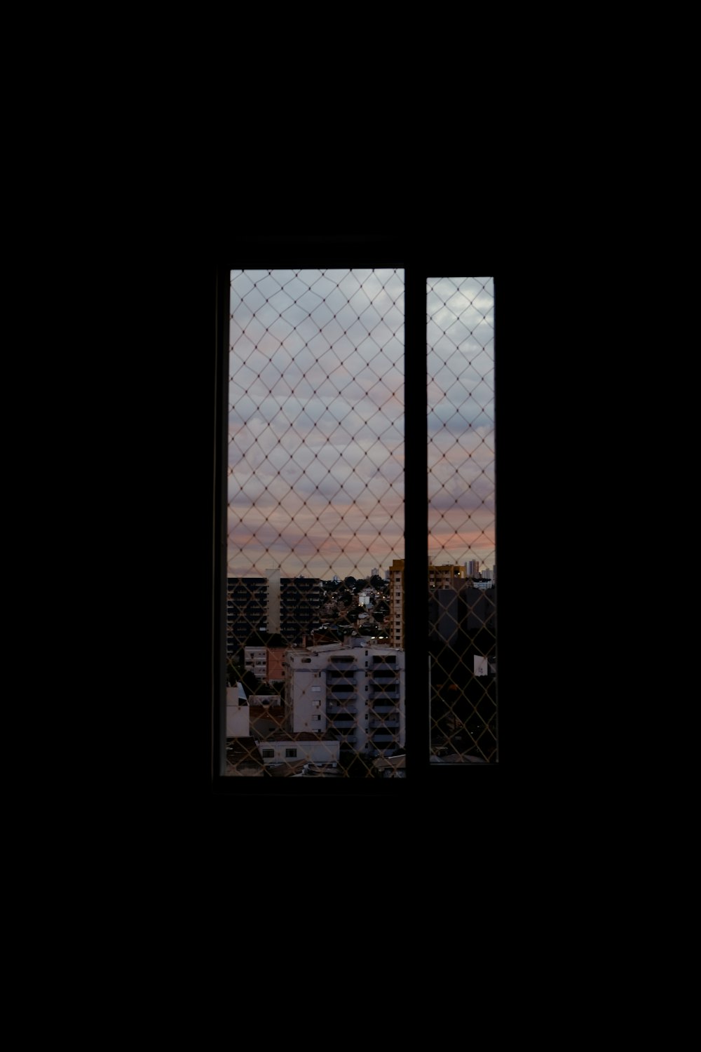 a view of a city through a window