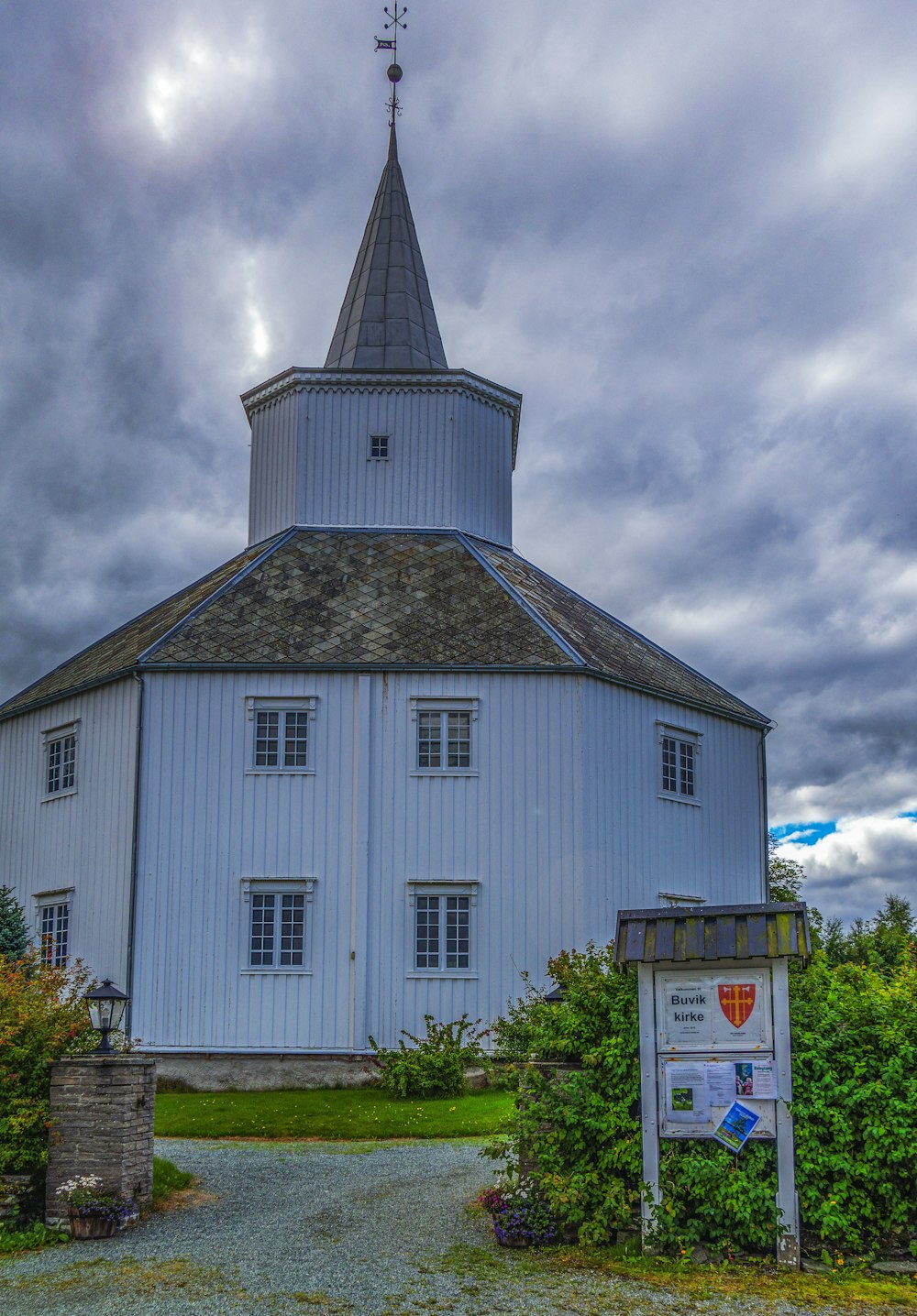 a large white building with a steeple on top