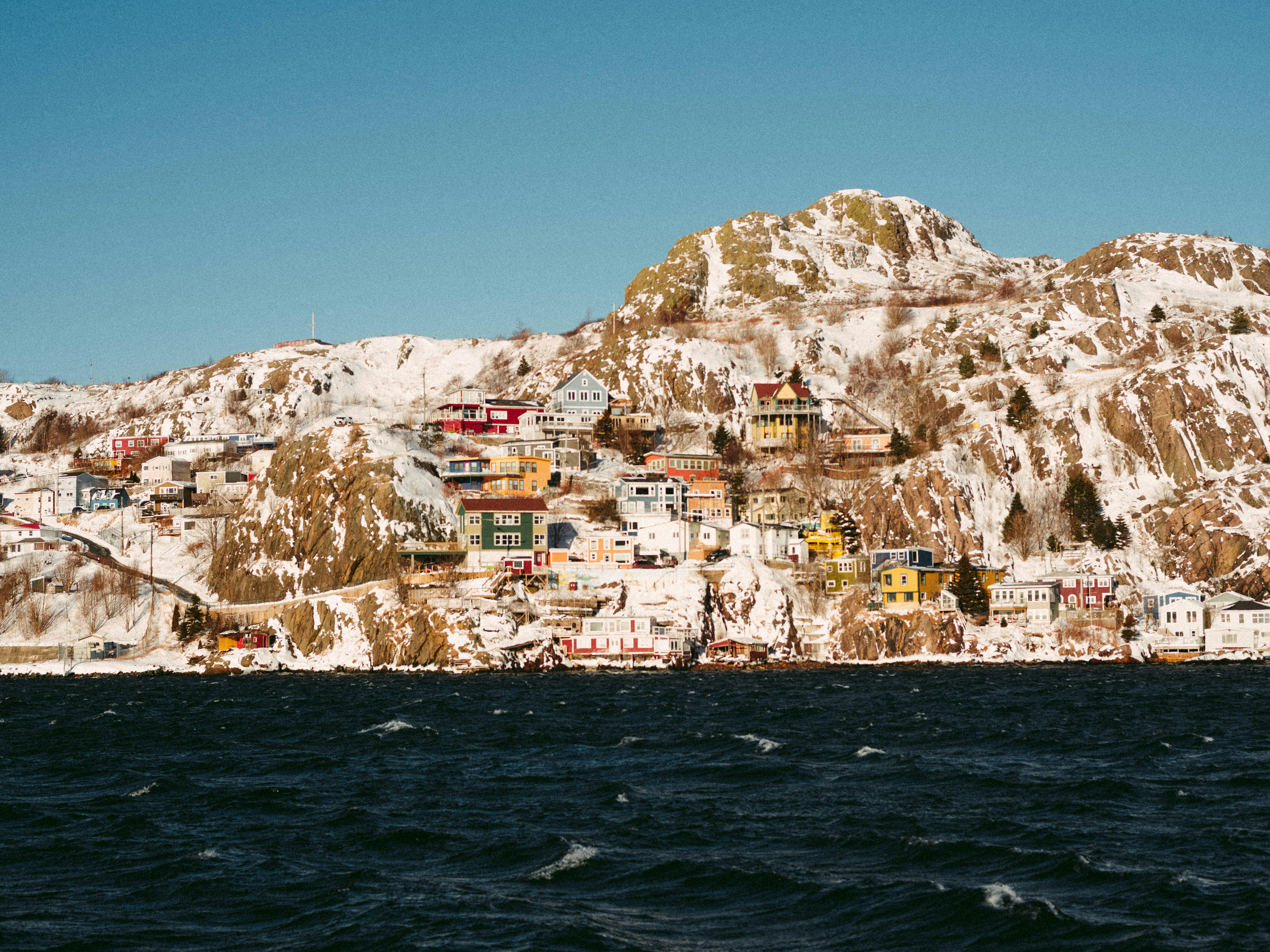 a mountain with houses on the side of it