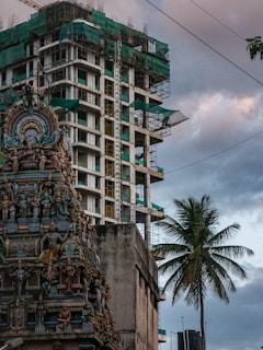 a very tall building with a clock on it's side