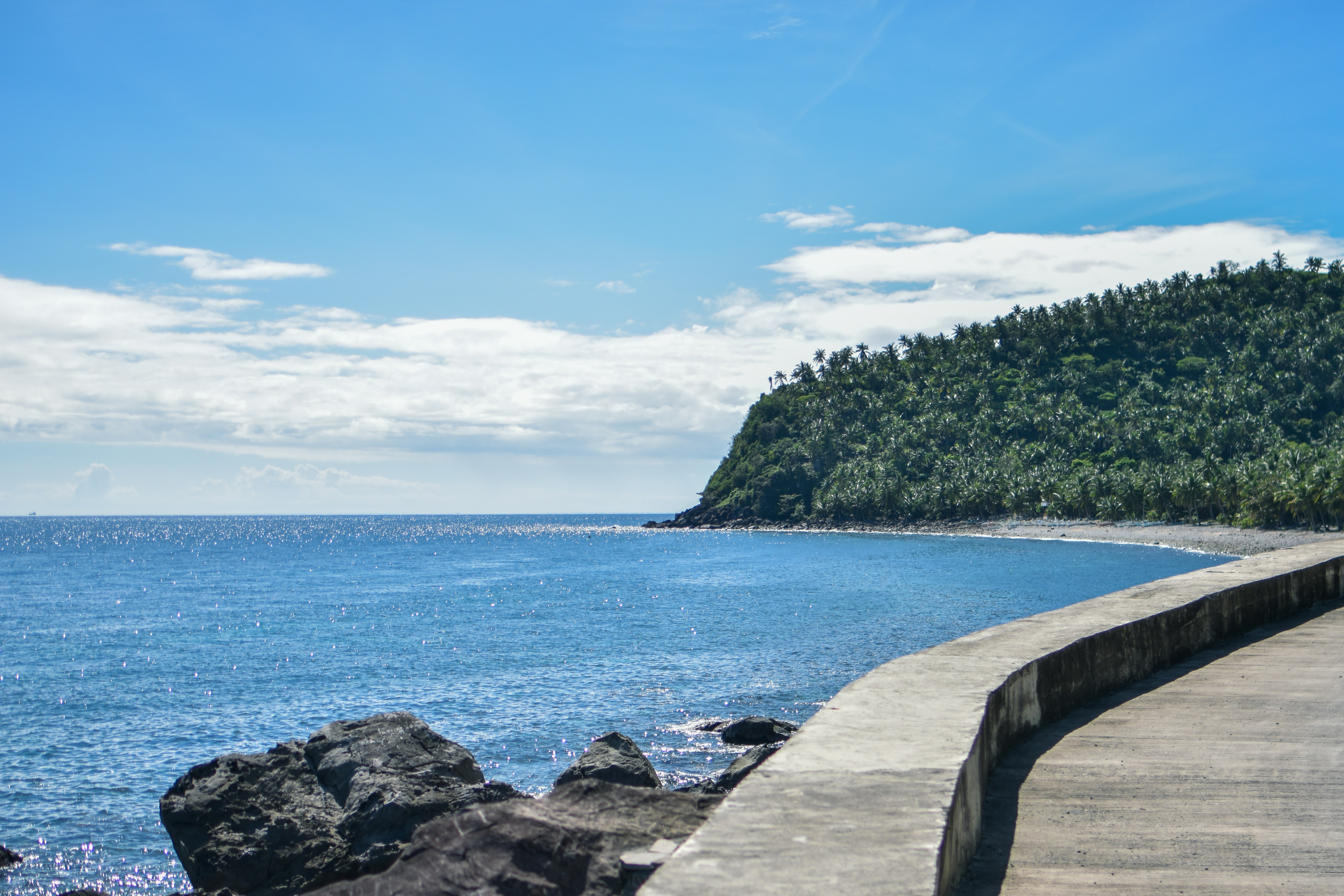 a view of a body of water from a walkway