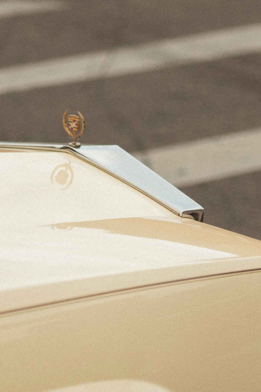 a close up of a car parked in a parking lot