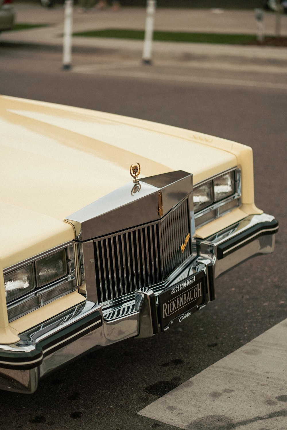 a yellow car parked on the side of the road