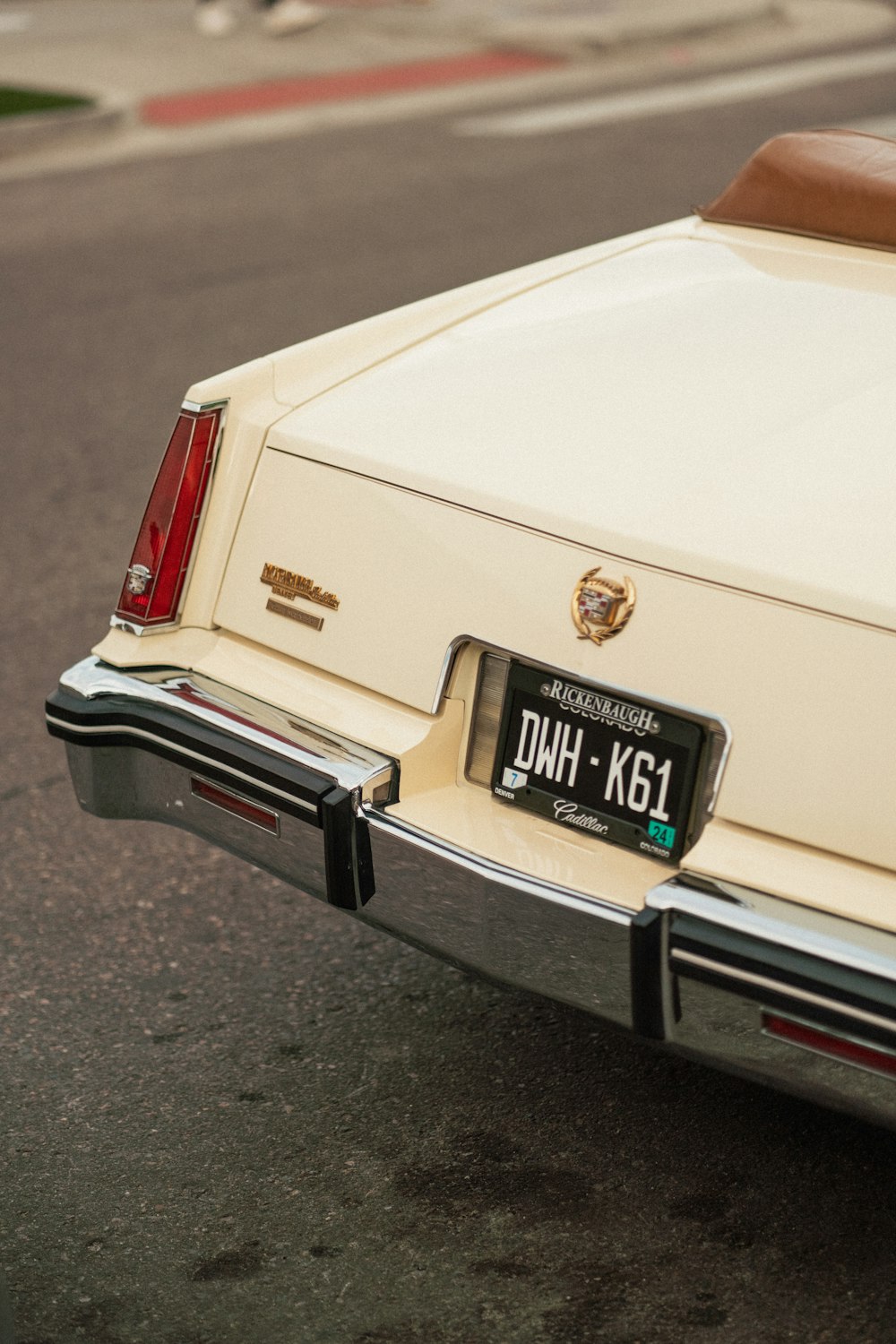 a white car parked on the side of the road