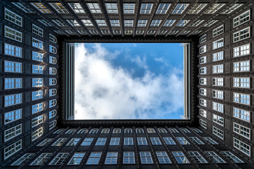 a very tall building with a sky in the background