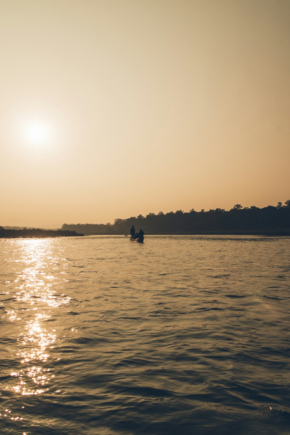 a person in a boat on a body of water