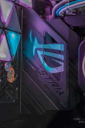 a close up of a purple and black computer case