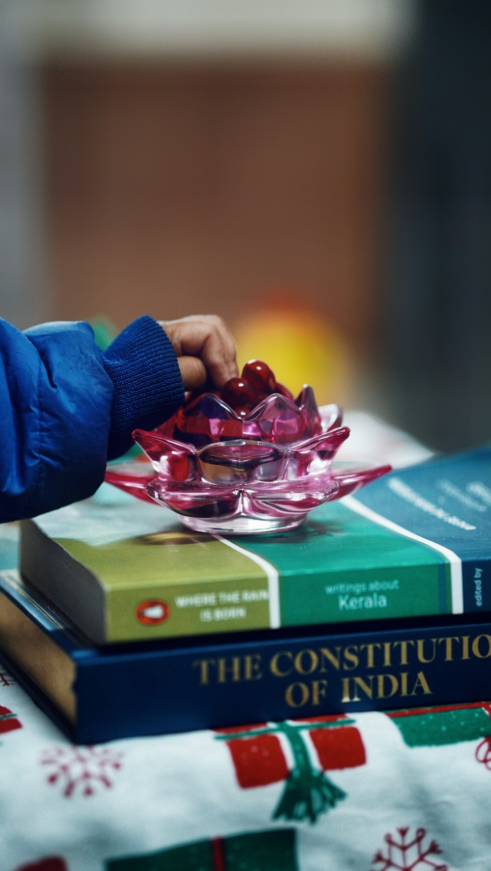 a stack of books sitting on top of a table