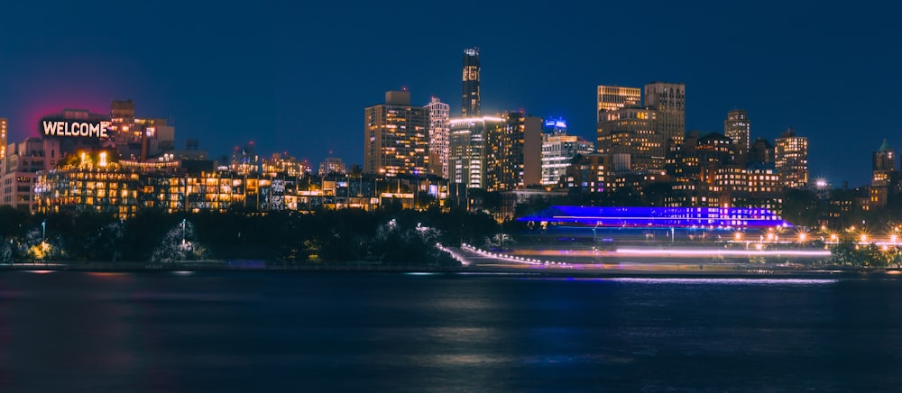 a view of a city at night from across the water