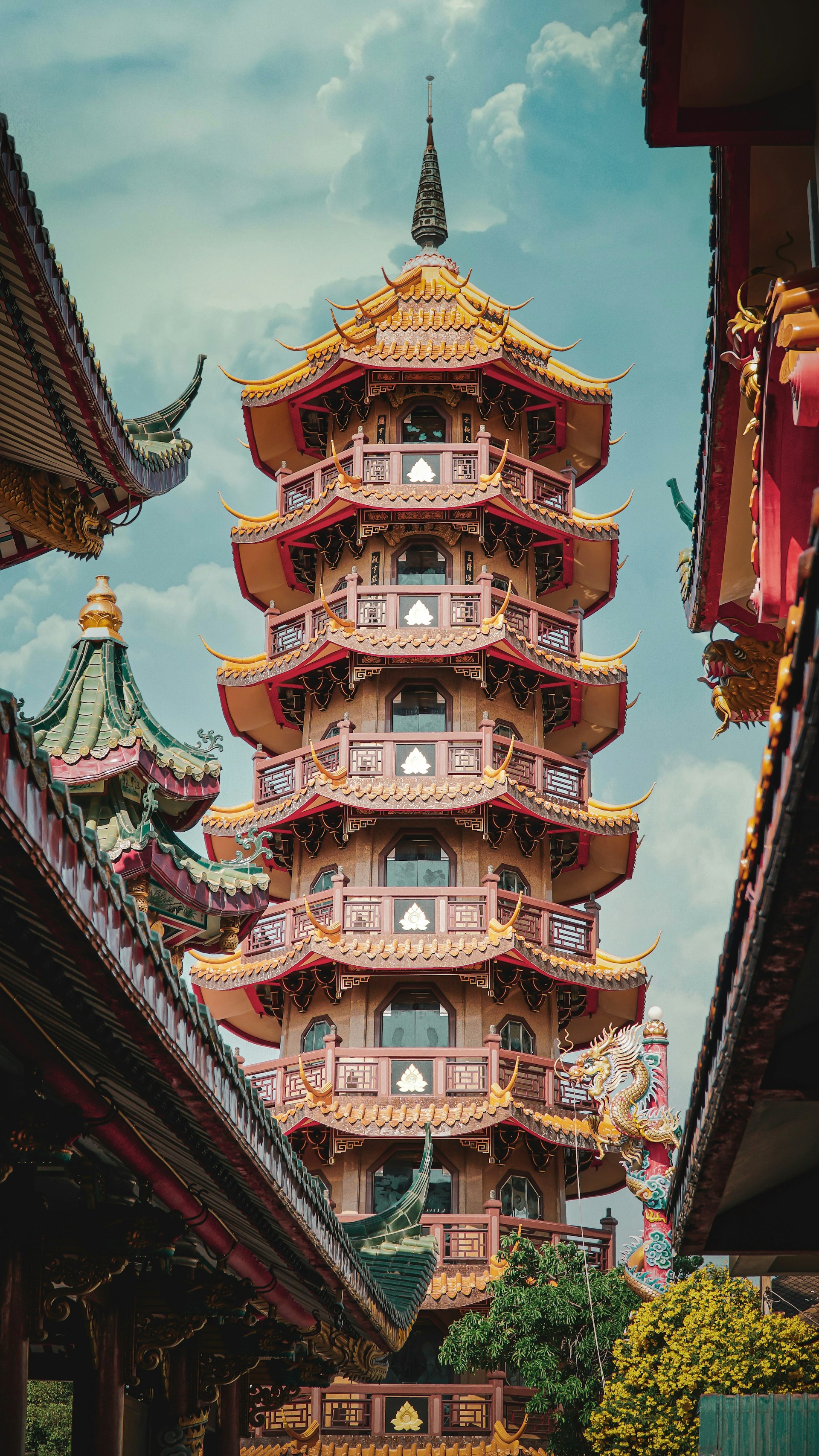 a tall building with a tower in the middle of it