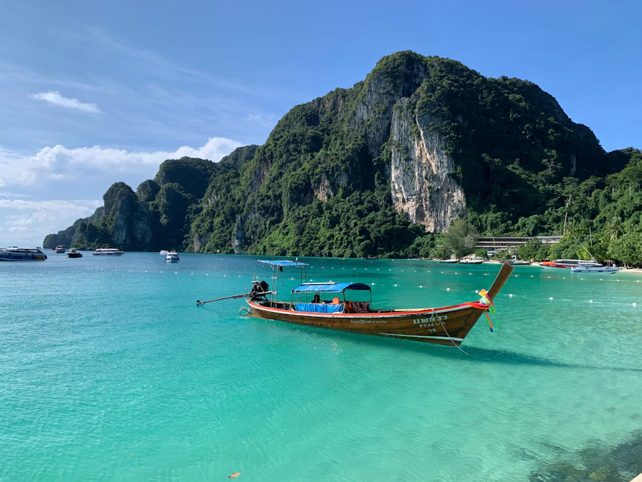Traditional longtail boat on turquoise water off Koh Phi Phi, Thailand