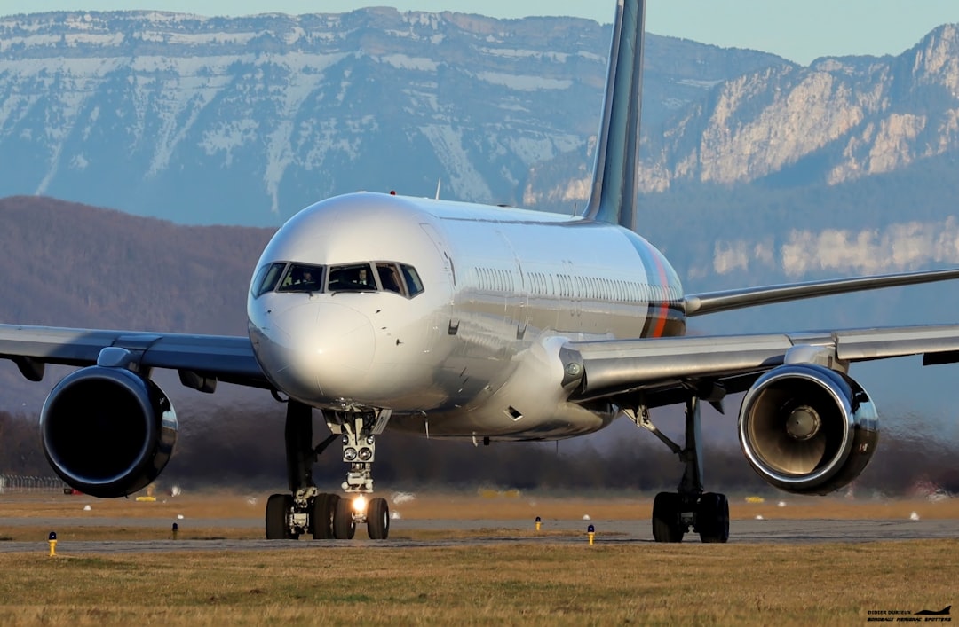 a large jetliner sitting on top of an airport runway,