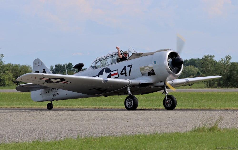 a small airplane sitting on top of a runway