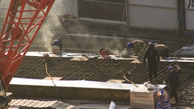 a group of men working on a construction site