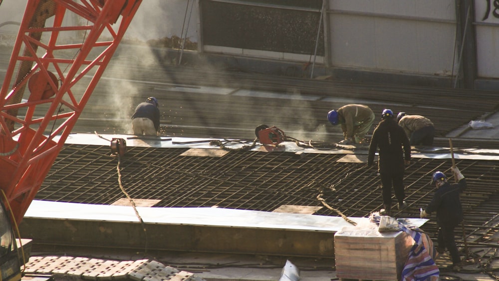 a group of men working on a construction site