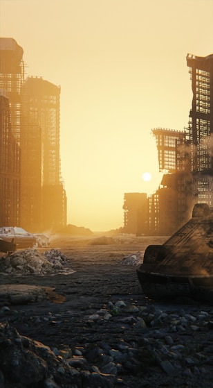 the sun is setting over a city with tall buildings