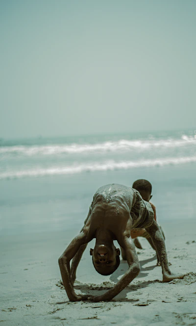 Accra Beach, Ghana — children playing at restored clean beach