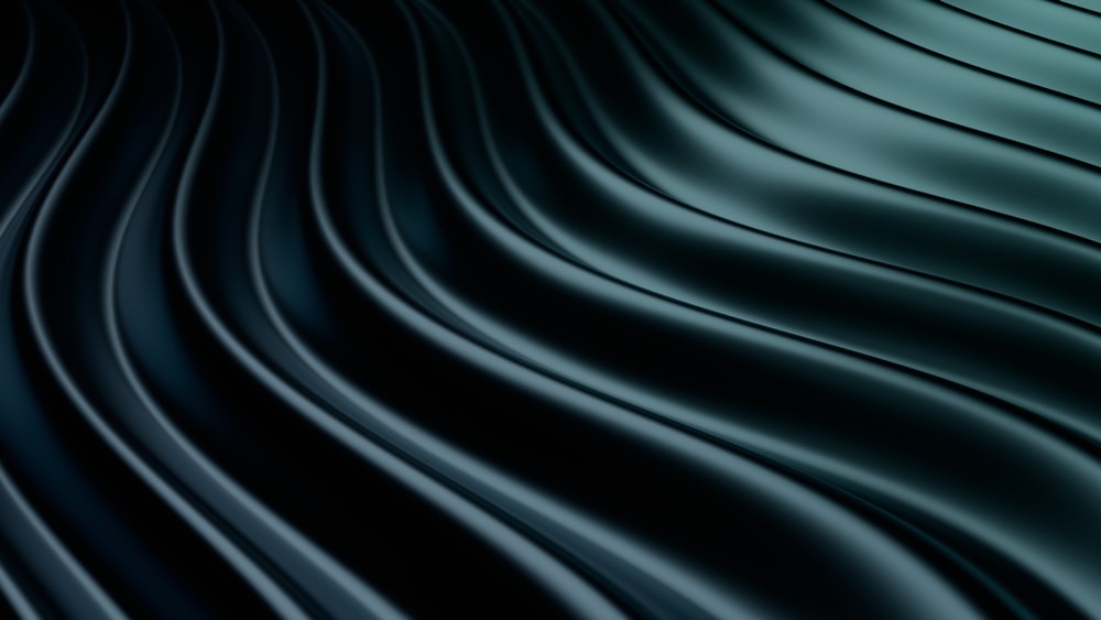 um fundo preto e azul com linhas onduladas