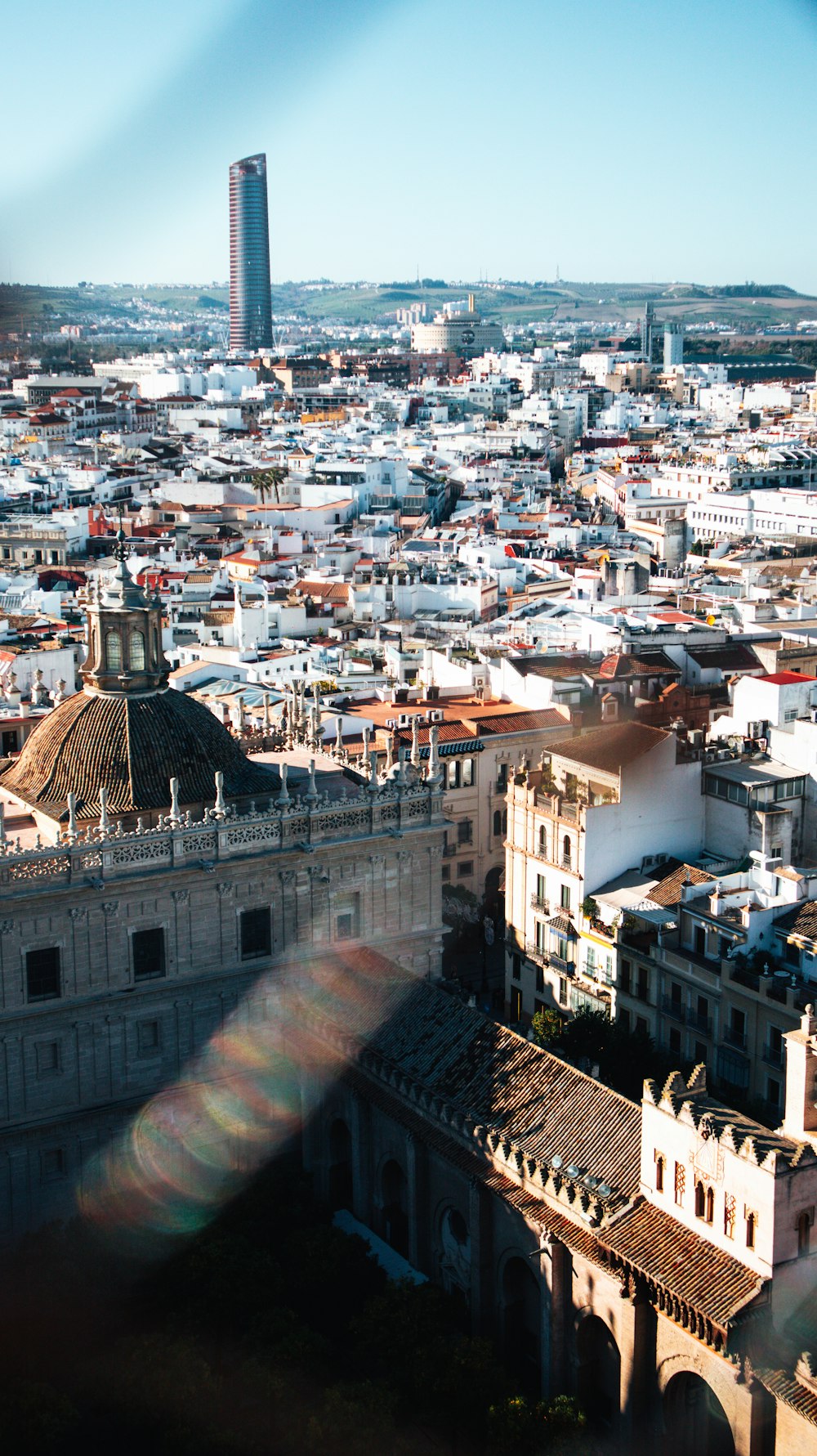 a view of a city from the top of a building