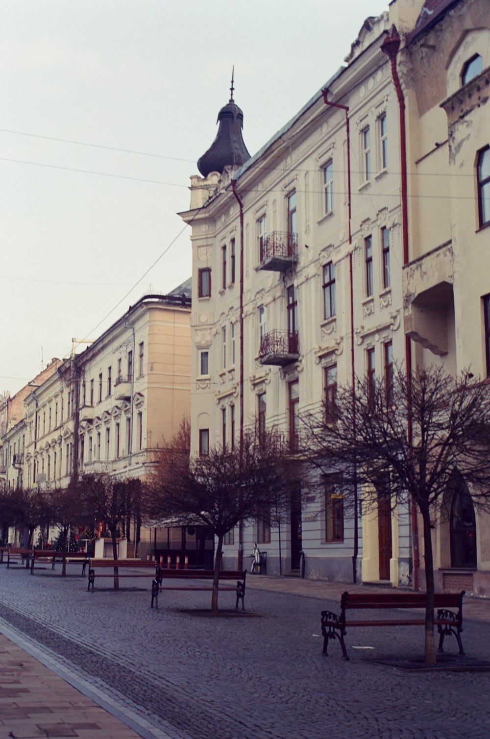 a row of buildings on a city street