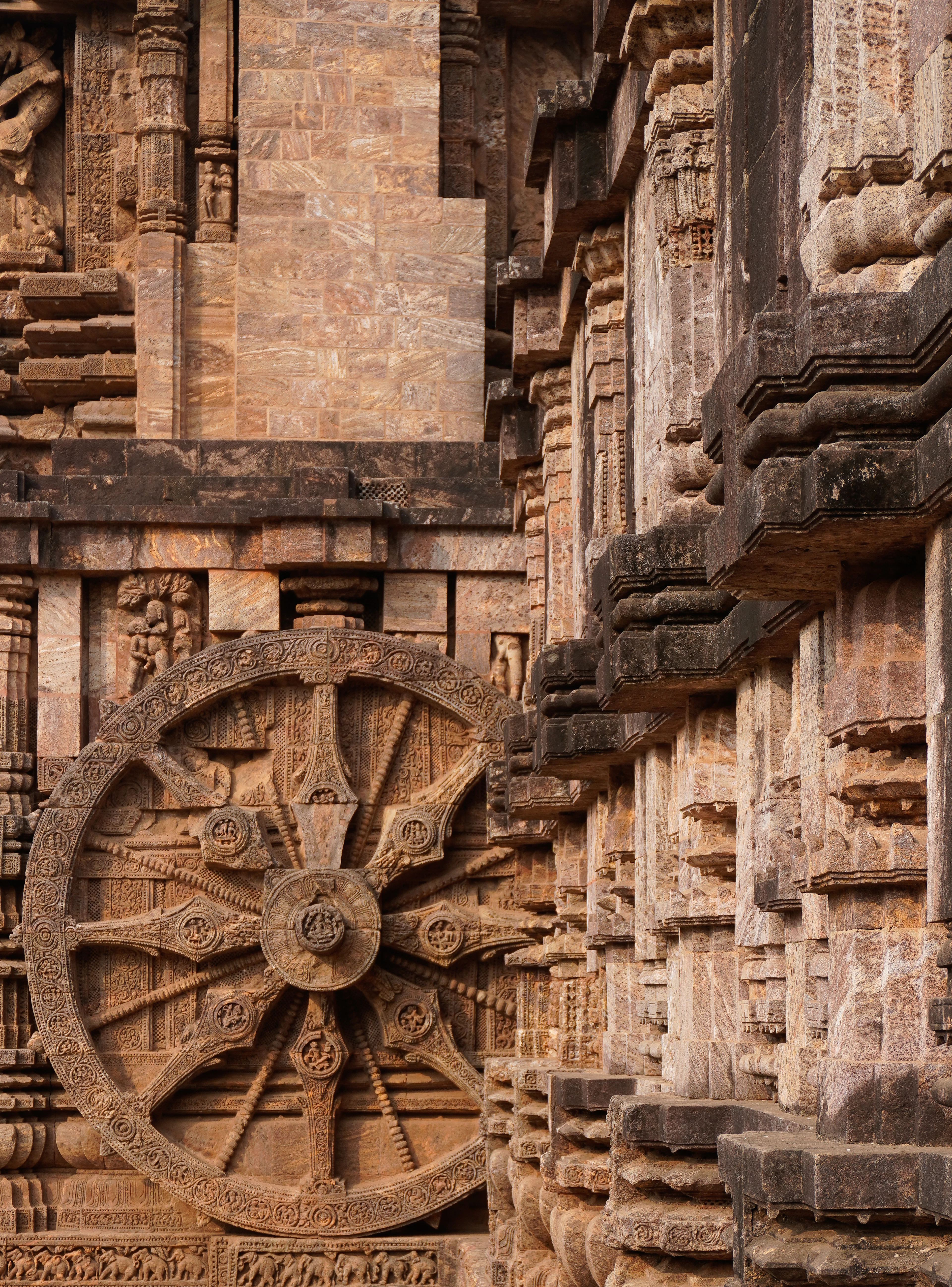 A carved stone chariot wheel at Konark Sun Temple